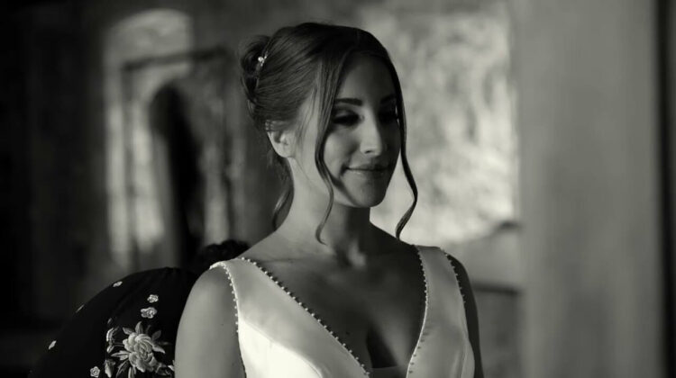 Couple enjoying their wedding day while a professional wedding videographer package captures every moment