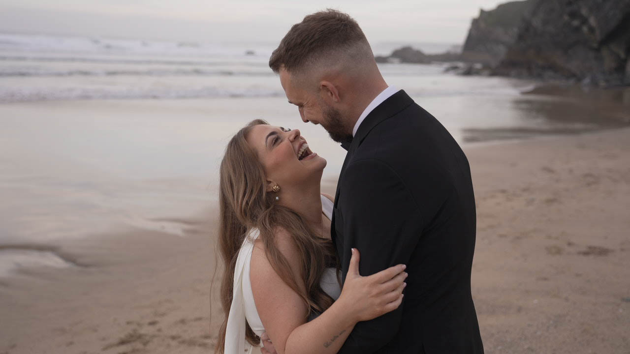 Bride and groom walking hand in hand – cinematic wedding videographer near me